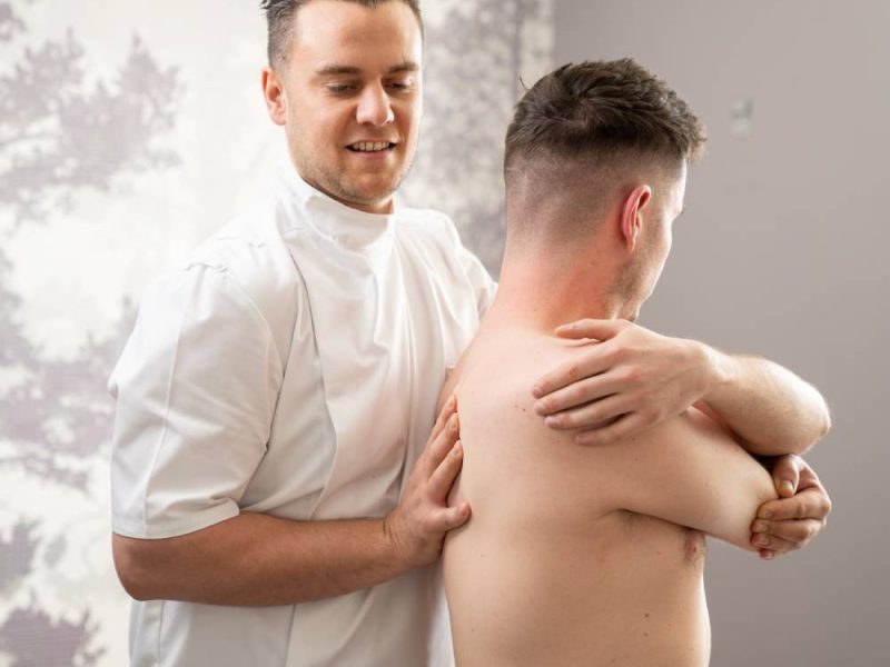 osteopath and patient